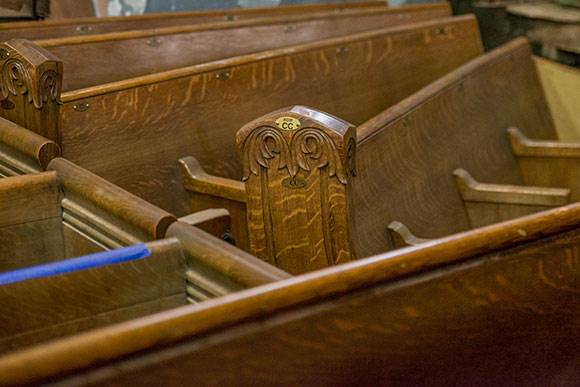 Old church pews at Old School Architectural Salvage Project