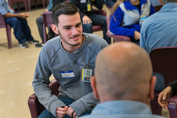 CWRU students and Inmates hold conversations and discussions amid breakout groups