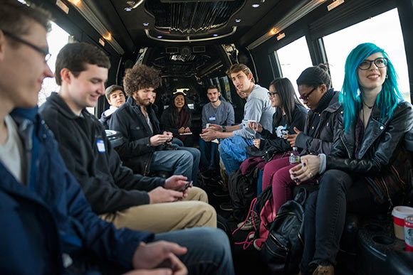 CWRU students in the bus on the ride back to campus