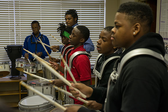 Aeneas Alldredge's drum class at John F. Kennedy High School’s E³agle Academy