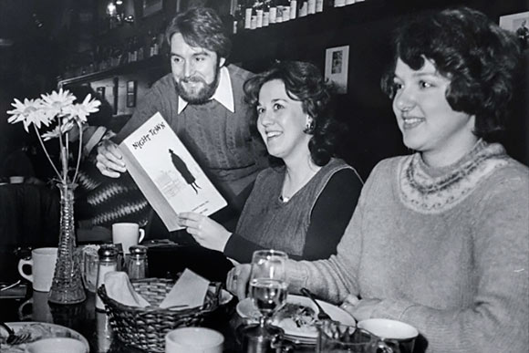 Nighttown, 1977: Nighttown manager Robert Durrin hands a dinner menu to a patron.