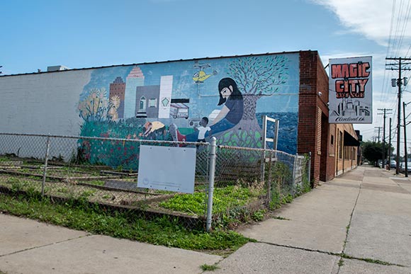 Mural on the side of the Magic City Lounge bldg on St Clair