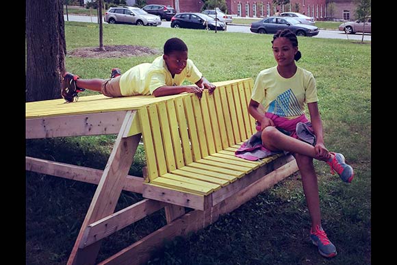 Johnathan Streeter and Zoe McClain-Ferrell checking out  the Stoop Slides constructed by MOOS