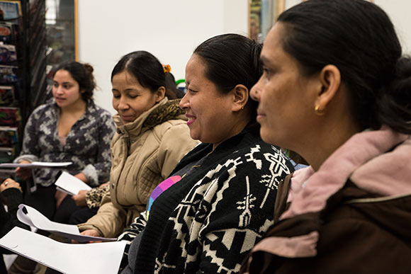 Nepali refugees practicing their English at the Welcome Hub