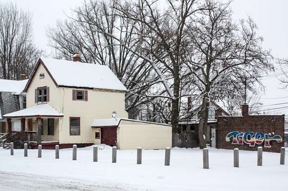 Several homes on the way to Coit Road Farmers Market are abandoned and boarded up
