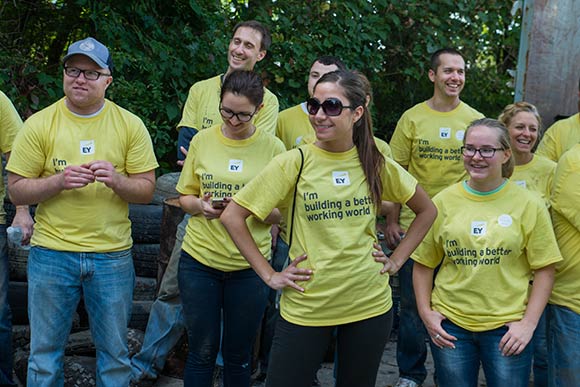 Ernst & Young volunteers gathered for a cleanup of the Euclid Railroad-Green Creek Corridor