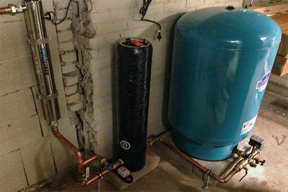 <span class="content-image-text">Rainwater collection tank in the basement at Mitchell's</span>