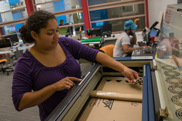 Preparing the lasar cutter in TechCentral