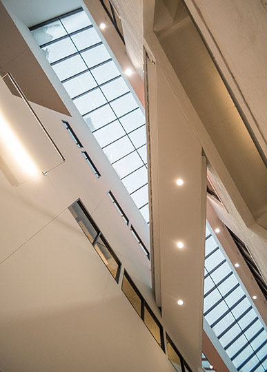 The airy, three-story atrium connecting the McCullough and Gund building