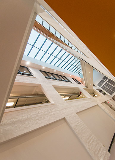 The airy, three-story atrium connecting the McCullough and Gund building