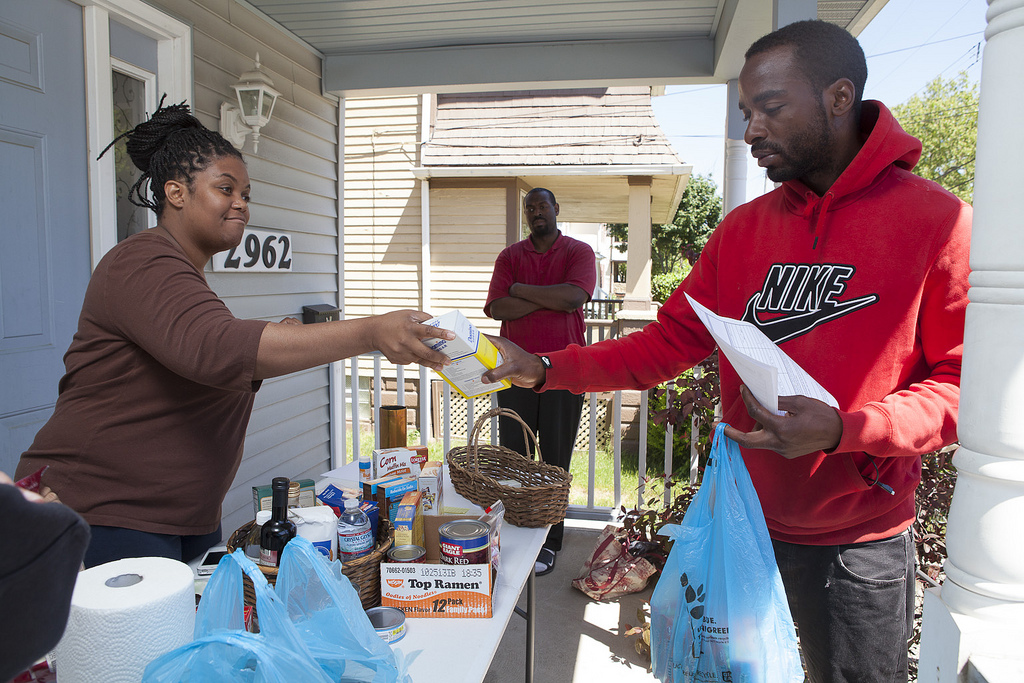 Dawn Arrington and her family conduct a Food and Amenity Exchange on her front porch