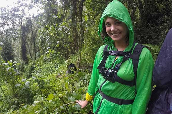 Lindsay Marissa Gorilla trekking in Uganda at Bwindi Impenetrable National Park (note the gorilla in the background)