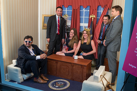 <span class="content-image-text">Having a photo taken in the "mini Oval Office" at the Facebook lounge</span>