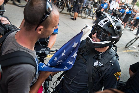 Confronted by a protester on Euclid Ave