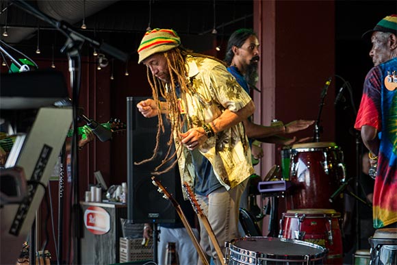 Carlos Jones performing at Reggae On The River at On Air Studio in the Flats