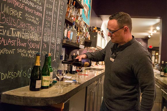 <span class="content-image-text">The Wine Spot owner Adam Fleischer</span>