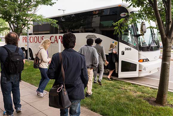 Forward Cities Cleveland Convening boarding the bus to the next stop
