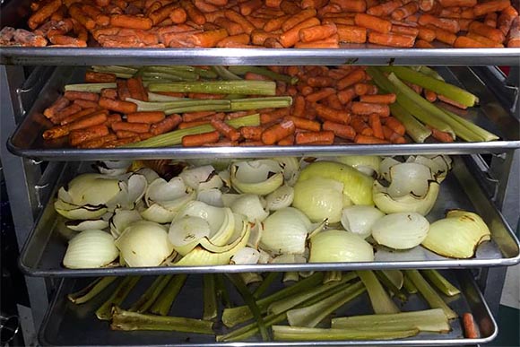 Roasting veggies at Erie Bone Broth