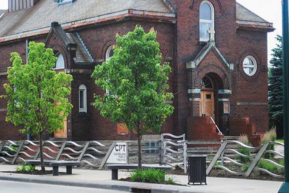 The Wave sculptural fence draws its form from the imagined wave vibrations of nearby Lake Erie