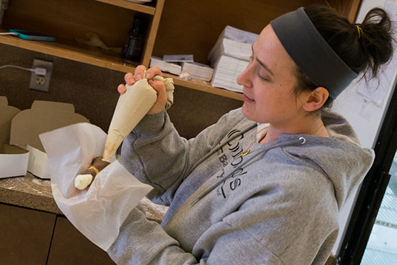 Filling the cannolis at Corbo’s Bakery