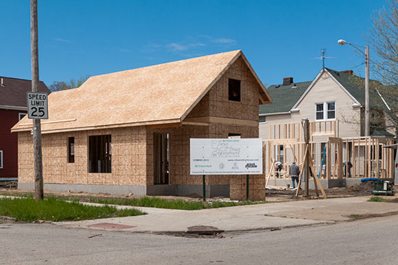 Tiny House Experiment construction on the corner of Pear Ave and West 58th Street