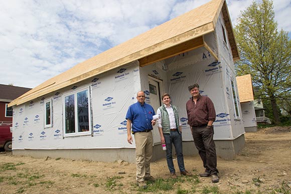 <span class="content-image-text">Keith Sutton of Sutton Development Group (left) with business partner Dave Territo (right) and Adam Davenport, head of EcoVillage Development (center)</span>