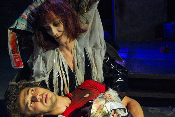 Production still of Lucy Bredeson-Smith and Geoffrey Hoffman in Spawn of the Petrolsexuals at convergence-continuum, July-August 2007