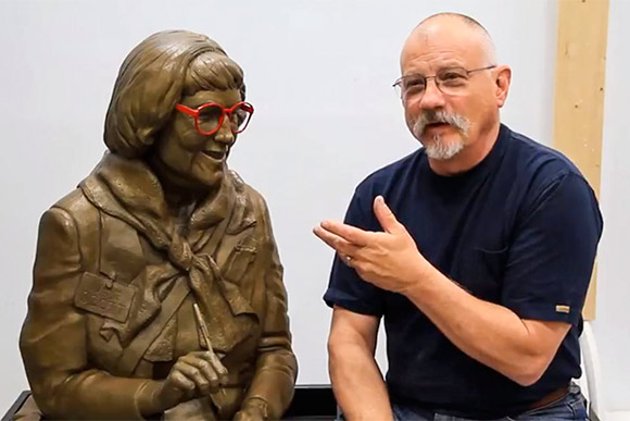 <span class="content-image-text">Former CIA President (and class of 1967 alum) David Deming with his sculpture of Plain Dealer rock critic Jane Scott at the Rock and Roll Hall of Fame</span>