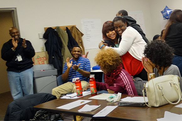 Graduating Class celebrating at Towards Employment