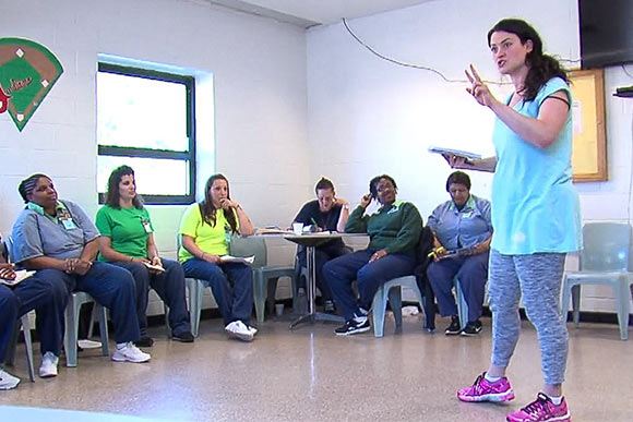 Lara Mielcarek directing inmates at Cleveland's Northeast Reintegration Center