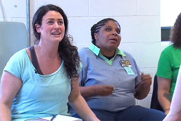 Lara Mielcarek directing inmates at Cleveland's Northeast Reintegration Center