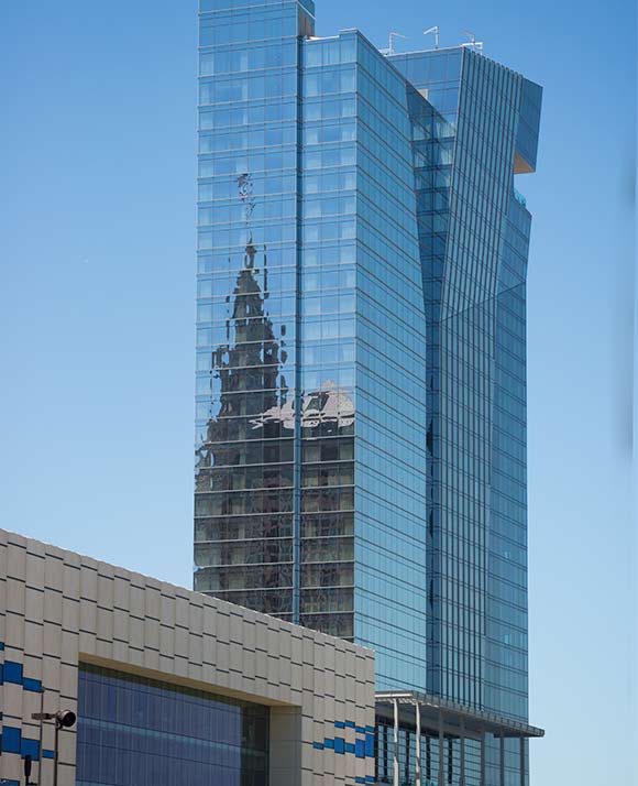 <span class="content-image-text">Hilton Cleveland Downtown Hotel reflecting the Terminal Tower</span>