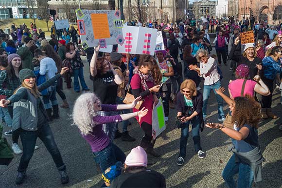 <span class="content-image-text">The march ends with dancing in Public Square</span>