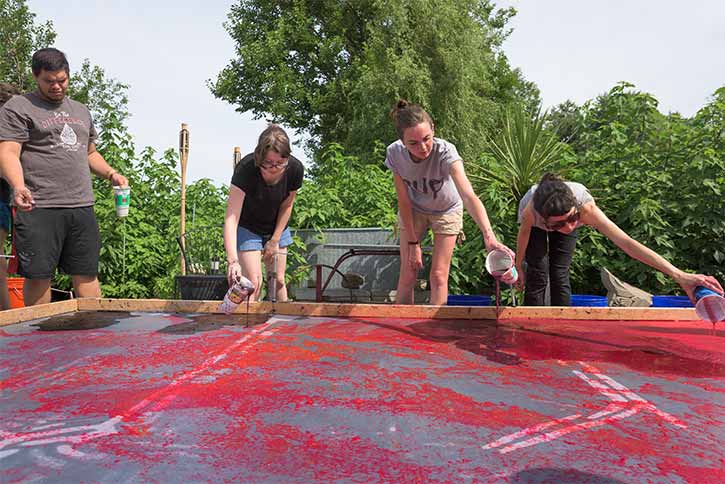 Resident Artist Hong Hong teaches the Conservatory's Summer 2017 interns techniques used in creating her signature large-scale paper pours