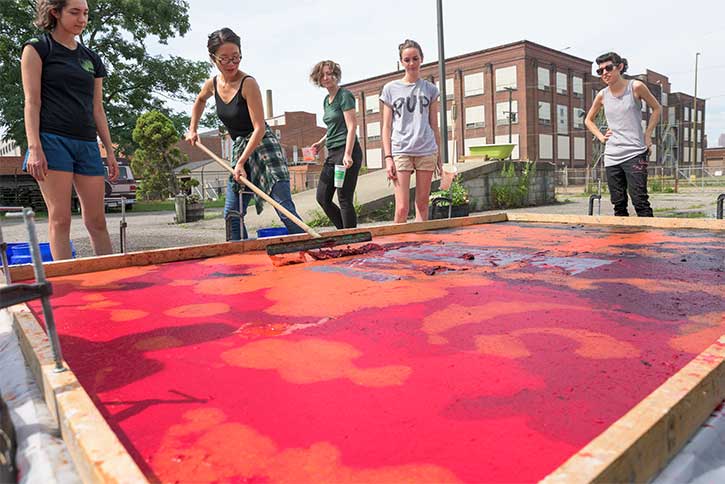 Resident Artist Hong Hong teaches the Conservatory's Summer 2017 interns techniques used in creating her signature large-scale paper pours