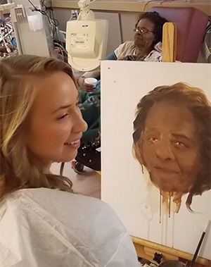 <span class="content-image-text">CIA student working on a dialysis portrait</span>