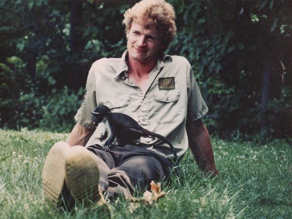 <span class="content-image-text">Tad in 1980 with a Diana Monkey that was born at the zoo</span>