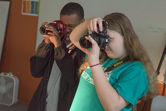 <span class="content-image-text">Photography students in the NewBridge after School program</span>