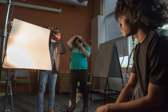 <span class="content-image-text">Photography students in the NewBridge after School program</span>