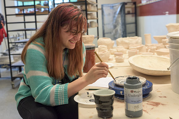 <span class="content-image-text">Ceramic class at the NewBridge after School program</span>