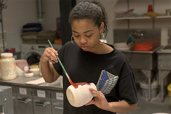 <span class="content-image-text">Ceramic class at the NewBridge after School program</span>