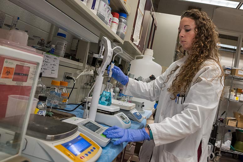 Research assistant Valerie Swank in the Cancer Research Lab at the Clinic