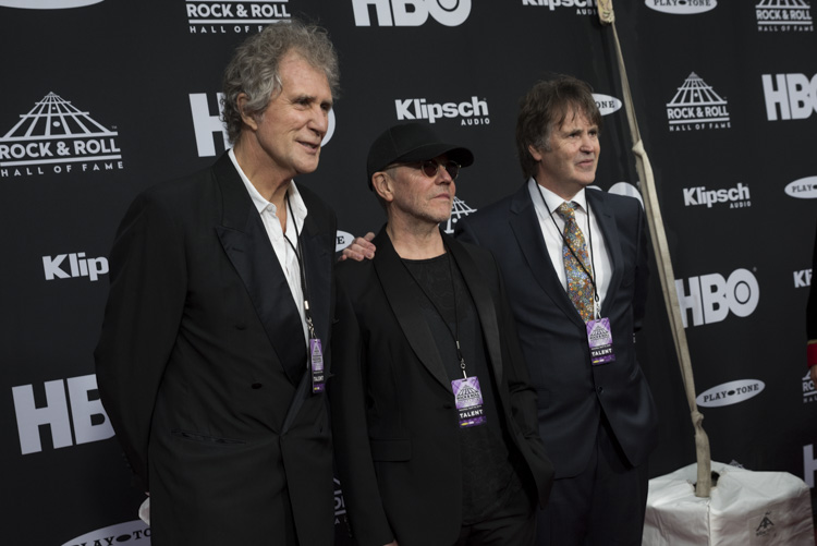 <span class="content-image-text">John Illsley, left to right, Alan Clark and Guy Fletcher, members of Dire Straits</span>