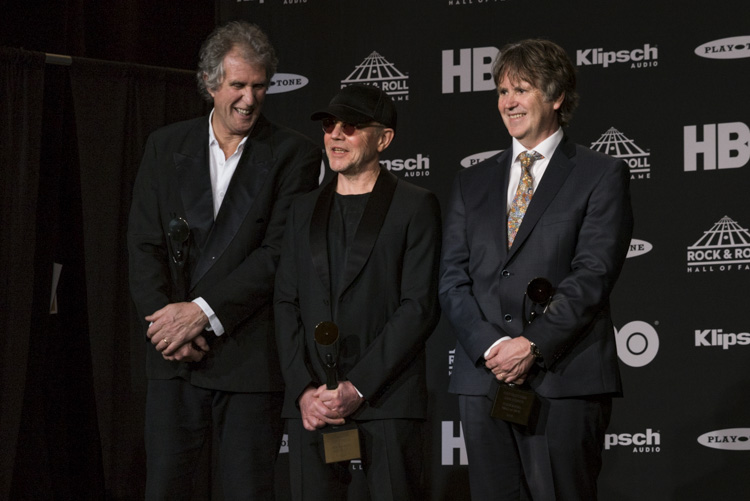 Members of Dire Straits backstage at the 33rd Rock & Roll Hall of Fame Induction Ceremony