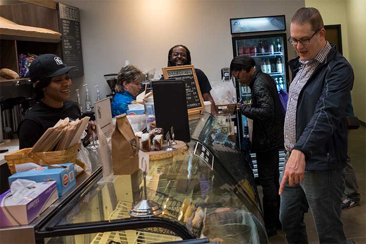 <span class="content-image-text">Reentry Week Cash Mob/Passport Bus Tour stop at Bloom Bakery</span>