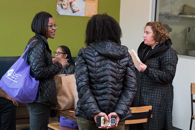 Reentry Week Cash Mob/Passport Bus Tour stop at Bloom Bakery