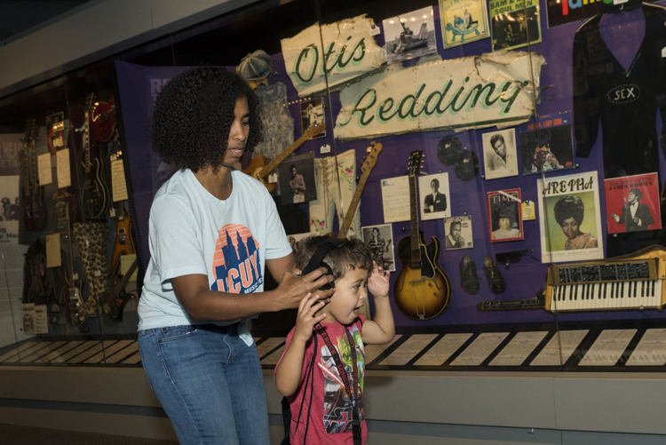 Risa Goehrke with son John trying out the sensory inclusion program items