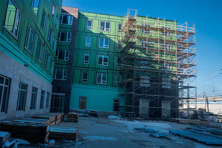 The playground under construction at the Music Settlement