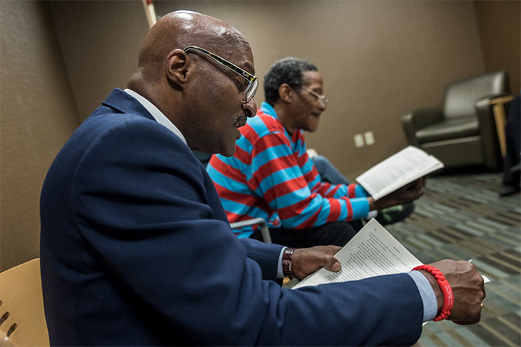 Walter Byers from the VA reads at a recent Books@Work session at the VA Domiciliary