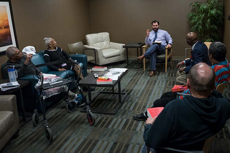 Thom Dawkins, a lecturer in the CWRU English Department facilitates a recent Books@Work session at the VA Domiciliary